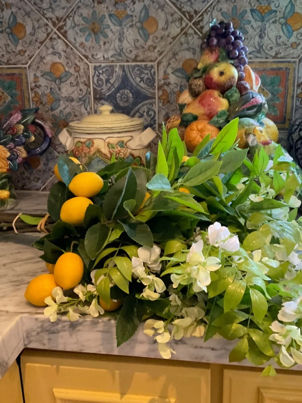 Pair of 2 faux flower arrangement made with faux lemons and small white/ green